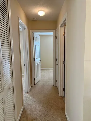 an empty room with a mirror