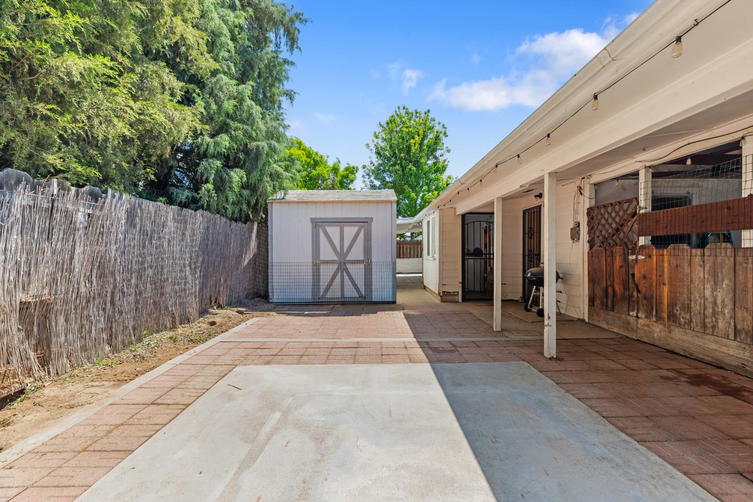 638 Orange Avenue Ripon, CA 95366 - Photo 20 of 30 a front view of a house with a garage