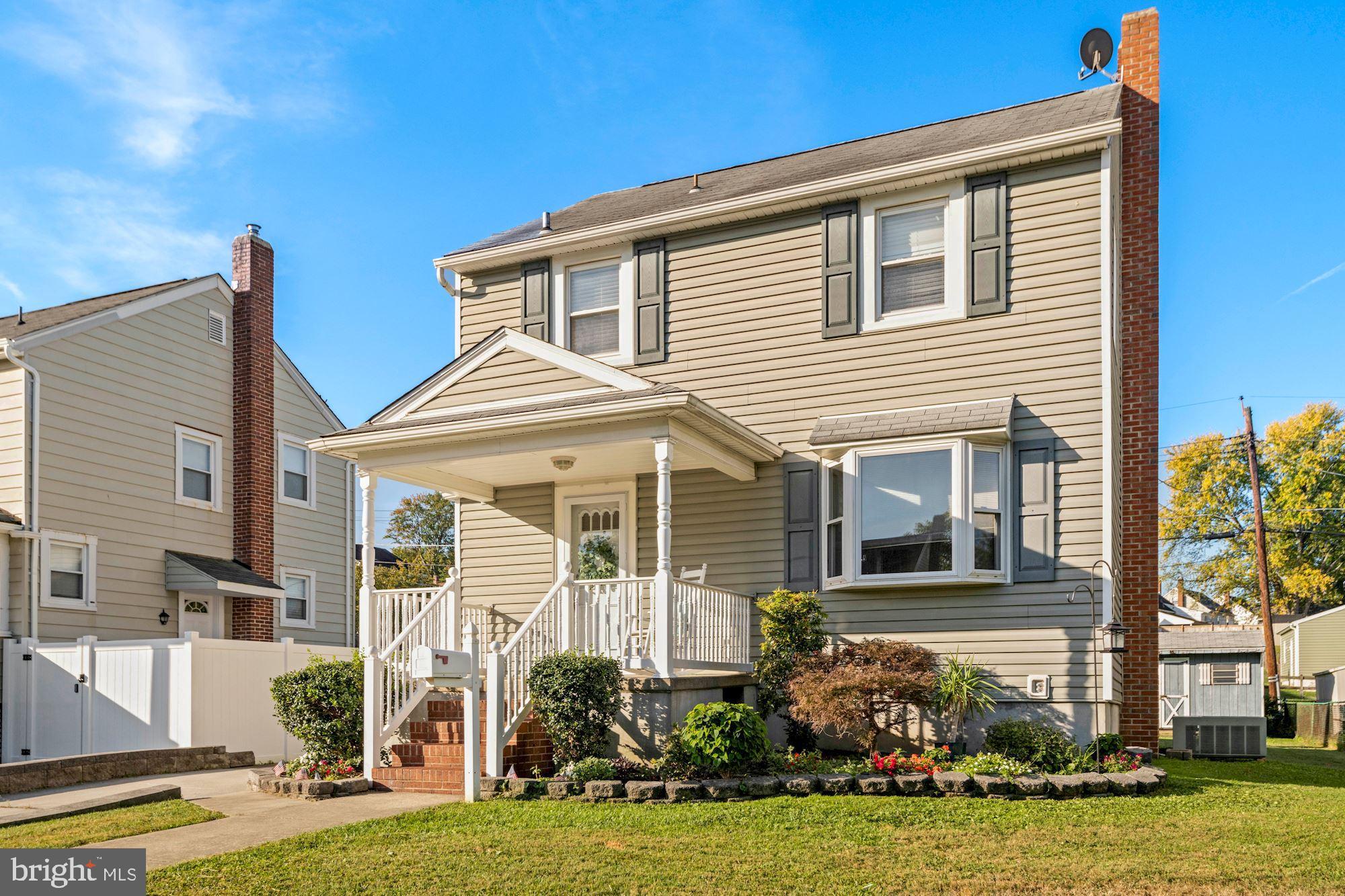 5524 Ashbourne Road Baltimore, MD 21227 - Photo 1 of 23 a front view of house with yard