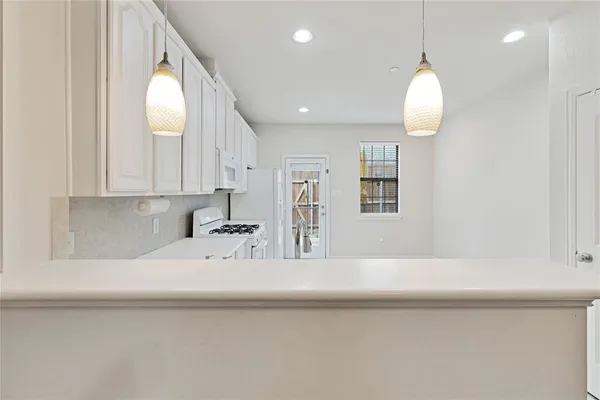 a bathroom with a sink a vanity and mirror
