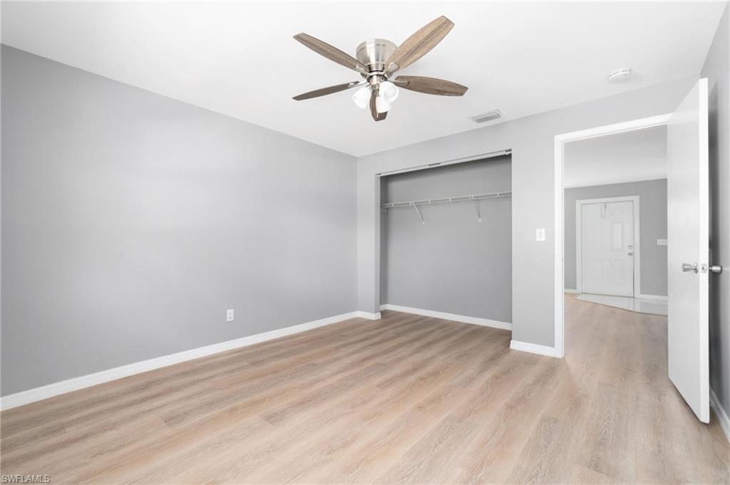 4337-4339 Mariner Road Bonita Springs, FL 34134 - Photo 16 of 29 wooden floor in an empty room