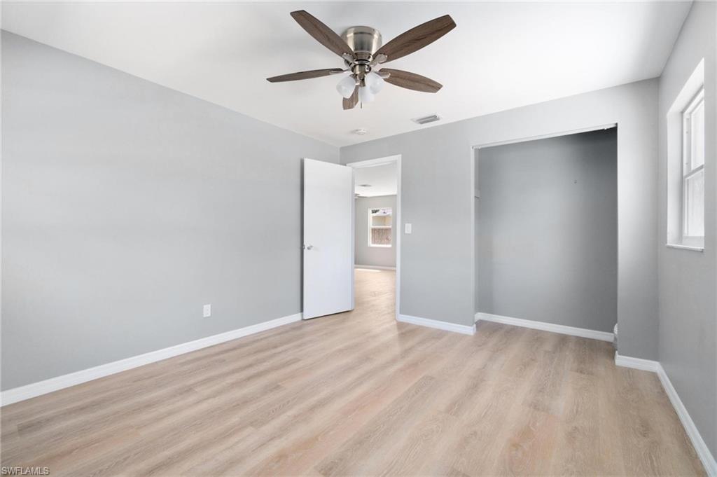 4337-4339 Mariner Road Bonita Springs, FL 34134 - Photo 19 of 29 wooden floor in an empty room