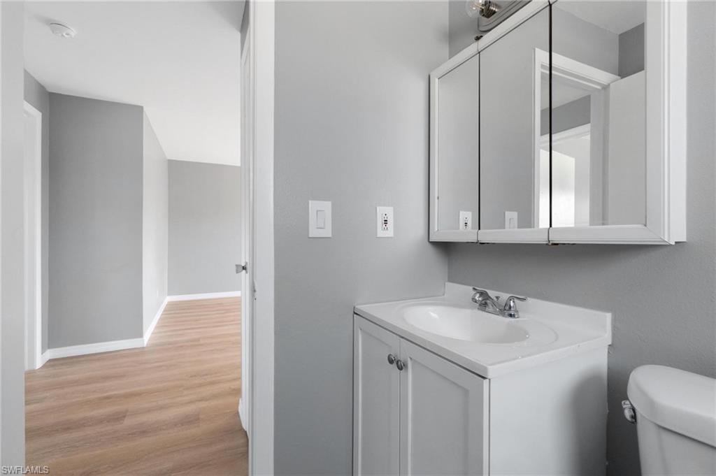 4337-4339 Mariner Road Bonita Springs, FL 34134 - Photo 22 of 29 a bathroom with a sink and a vanity
