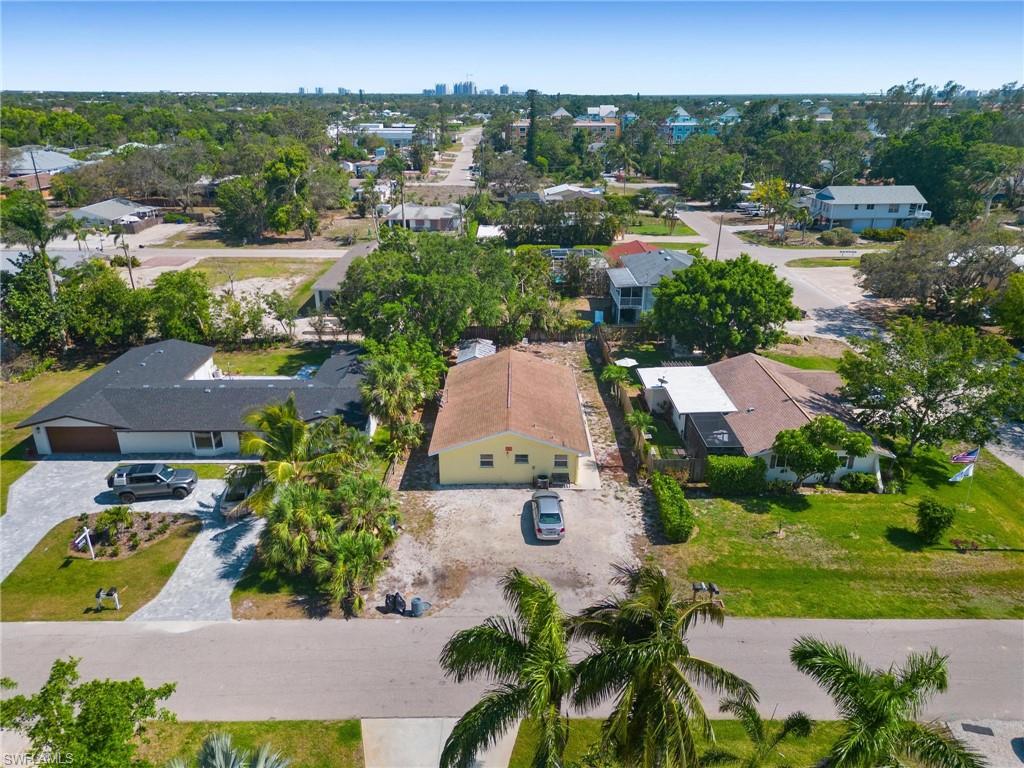 4337-4339 Mariner Road Bonita Springs, FL 34134 - Photo 23 of 29 an aerial view of residential houses with outdoor space and street view
