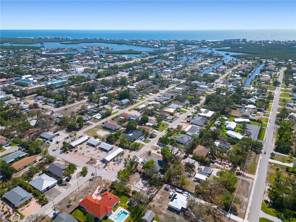 4337-4339 Mariner Road Bonita Springs, FL 34134 - Photo 25 of 29 an aerial view of a city with lots of residential buildings