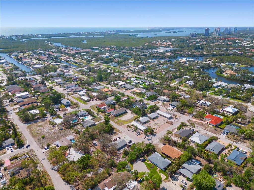 4337-4339 Mariner Road Bonita Springs, FL 34134 - Photo 26 of 29 an aerial view of residential houses with city view