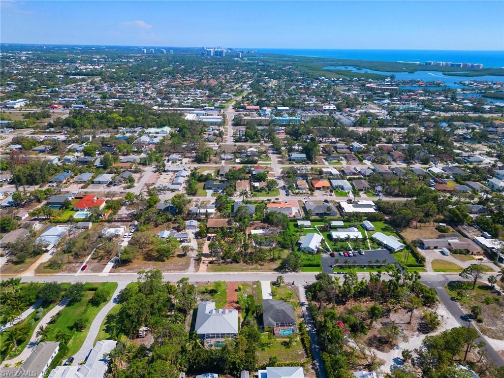 4337-4339 Mariner Road Bonita Springs, FL 34134 - Photo 29 of 29 an aerial view of residential houses with outdoor space and trees