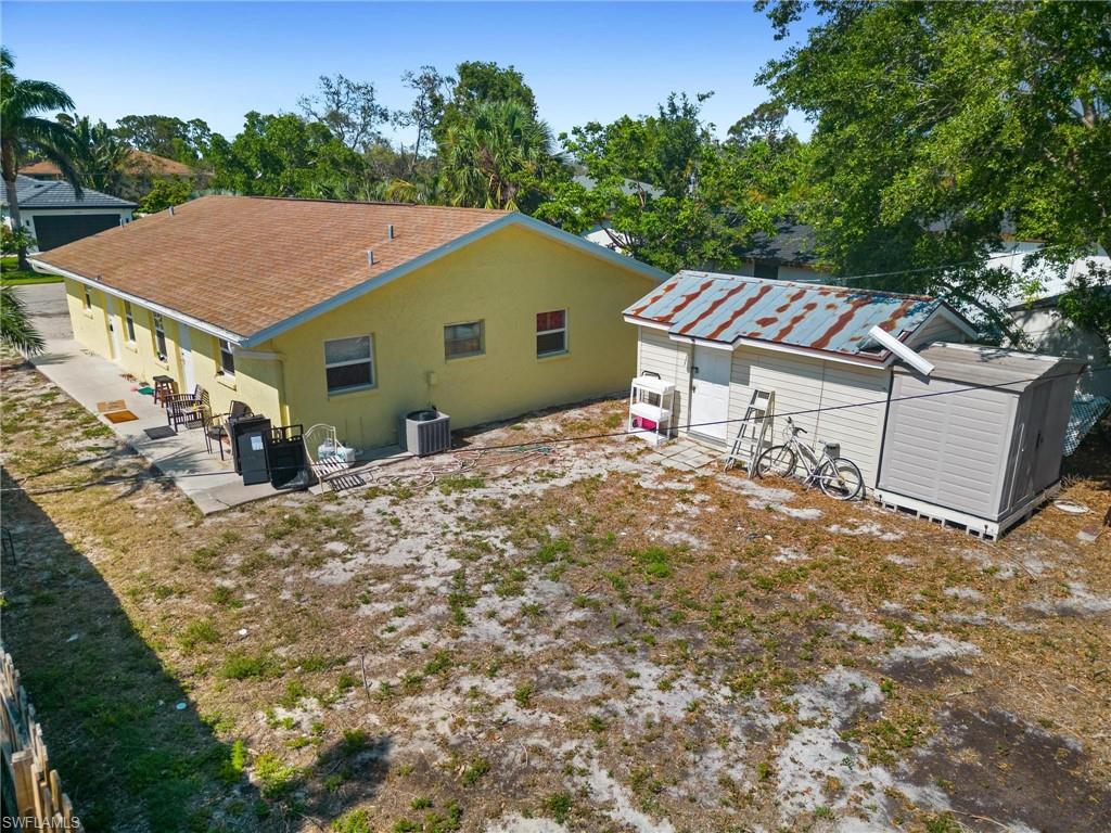 4337-4339 Mariner Road Bonita Springs, FL 34134 - Photo 3 of 29 a view of a house with a yard