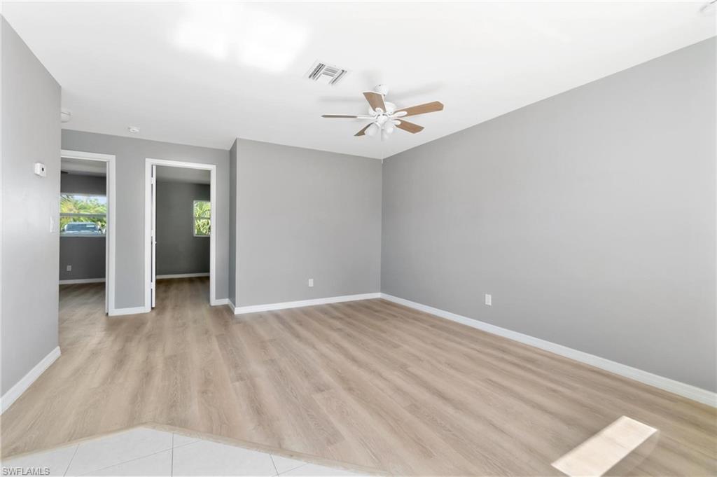 4337-4339 Mariner Road Bonita Springs, FL 34134 - Photo 8 of 29 an empty room with closet and a ceiling fan