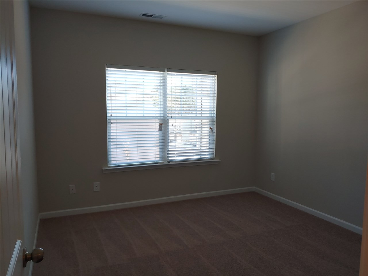 1204 Wingstem Place, Unit 2 Raleigh, NC 27607 - Photo 14 of 23 Bedroom 3 has double windows as well let the sunshine in!