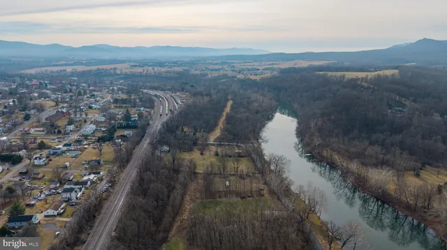 a view of a lake with mountains in the background
