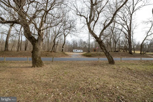 a view of a wooden floor next to a lake