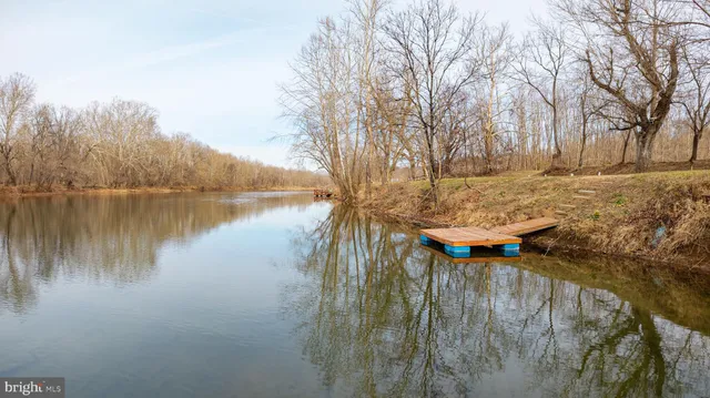 a view of a pool with a yard