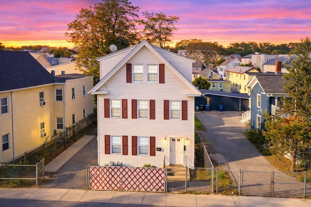 42 Morton Street Lawrence, MA 01841 - Photo 1 of 24 a view of a large white building
