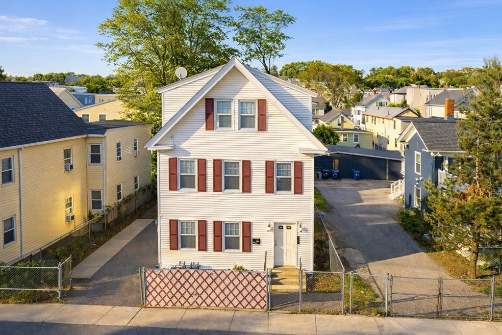 42 Morton Street Lawrence, MA 01841 - Photo 2 of 24 a view of a large white building