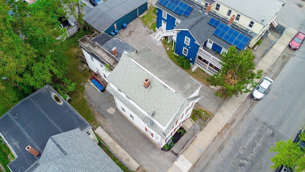 42 Morton Street Lawrence, MA 01841 - Photo 5 of 24 an aerial view of residential houses with outdoor space