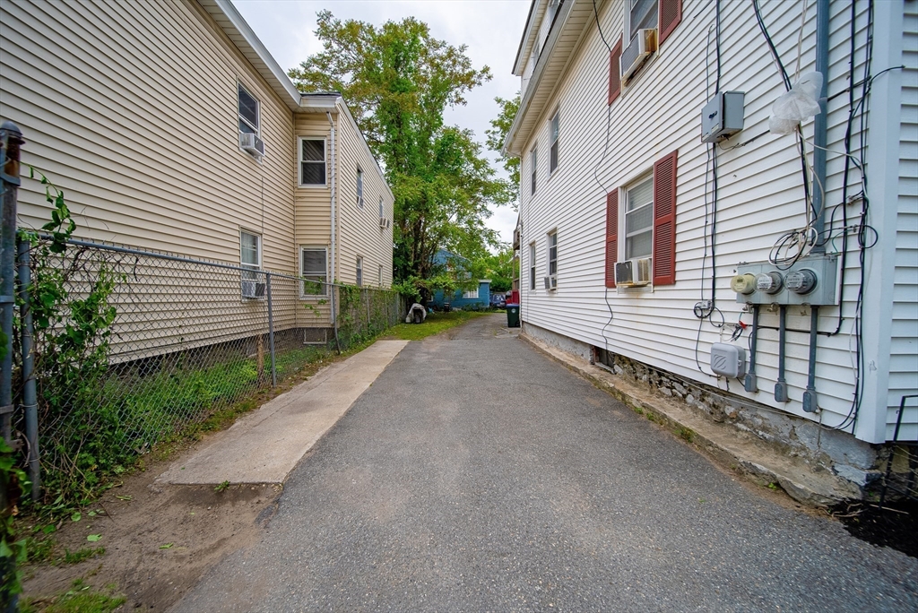 42 Morton Street Lawrence, MA 01841 - Photo 7 of 24 a view of a house with a yard