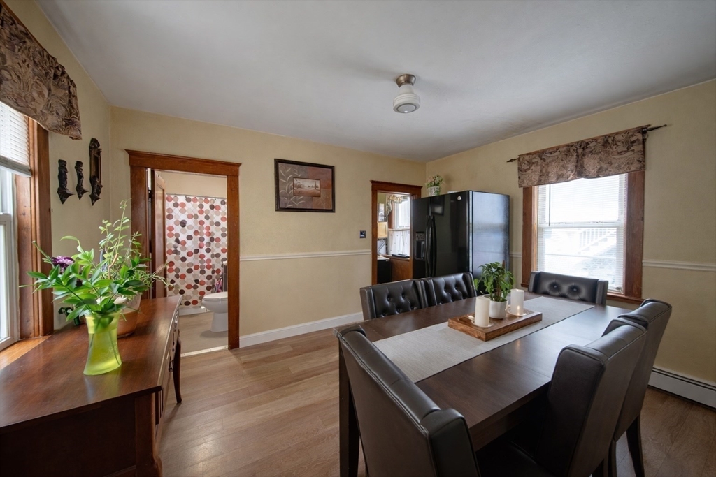 42 Morton Street Lawrence, MA 01841 - Photo 10 of 24 a view of a dining room with furniture window and wooden floor