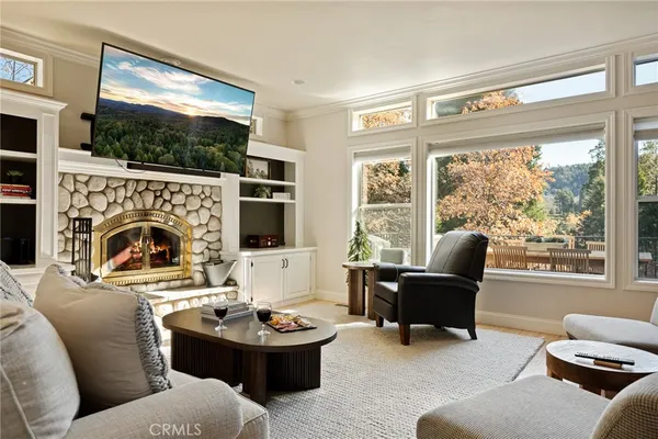 a living room with furniture and a table