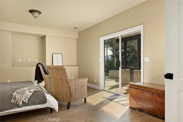 a view of a livingroom with workspace and a window