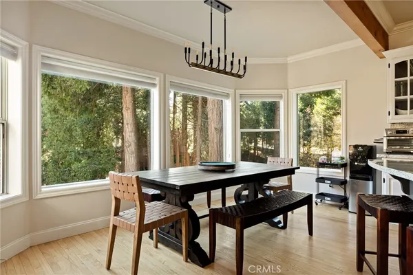 a living room with furniture fireplace and window