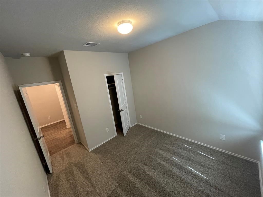 13872 Rock Island Trail Conroe, TX 77384 - Photo 13 of 32 an empty room with a window