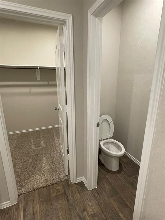 13872 Rock Island Trail Conroe, TX 77384 - Photo 21 of 32 a bathroom with a toilet and a shower