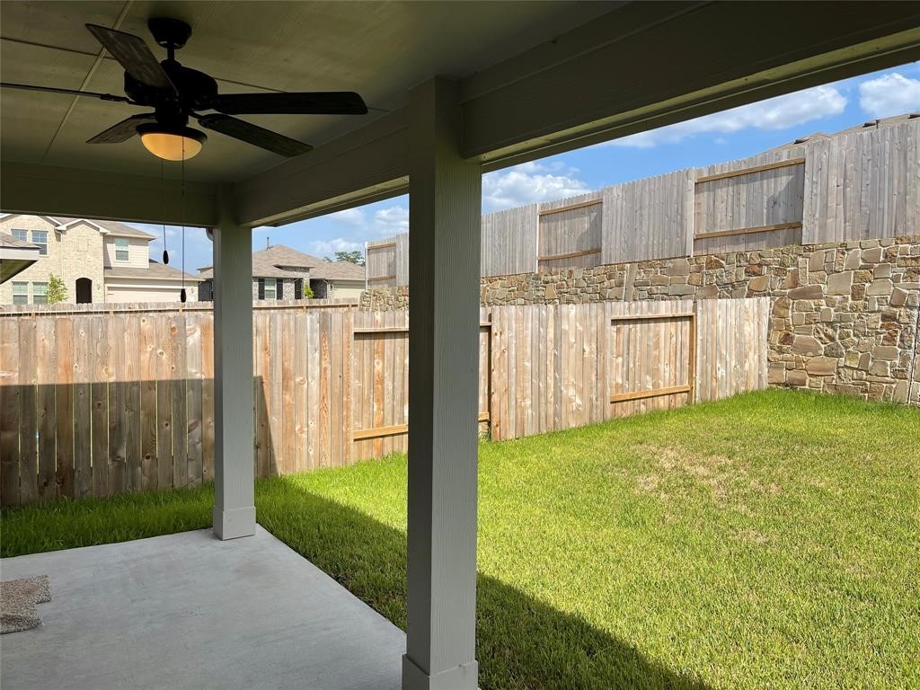 13872 Rock Island Trail Conroe, TX 77384 - Photo 27 of 32 a view of a porch with a backyard