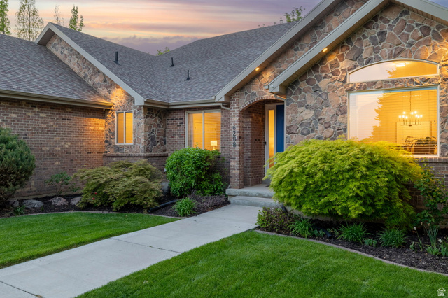 6208 West Bull River Road Highland, UT 84003 - Photo 71 of 90 Stone and brick facade with an arched entry