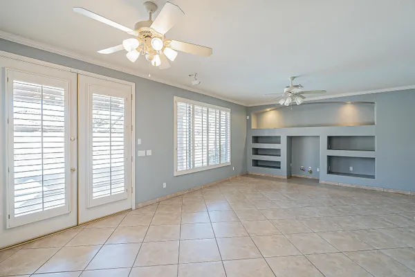 a kitchen with a stove a refrigerator and a sink