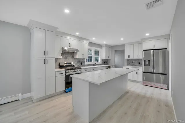 $925,000 | 827 Aberdeen Road, West Bay Shore, NY 11706