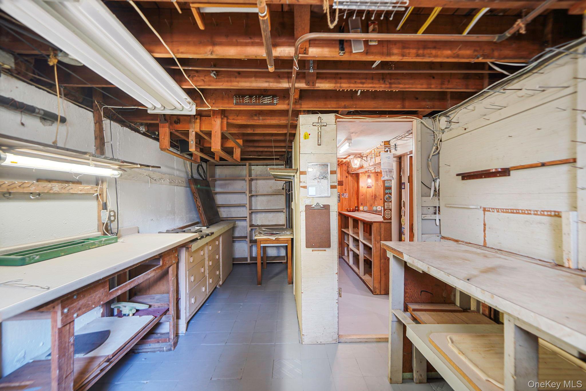 827 Aberdeen Road West Bay Shore, NY 11706 - Photo 35 of 40 Unfinished below grade area with a workshop area