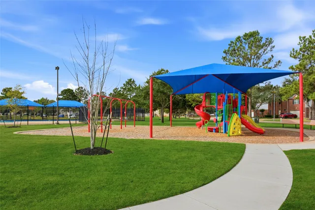 a view of a swimming pool with a lounge chairs