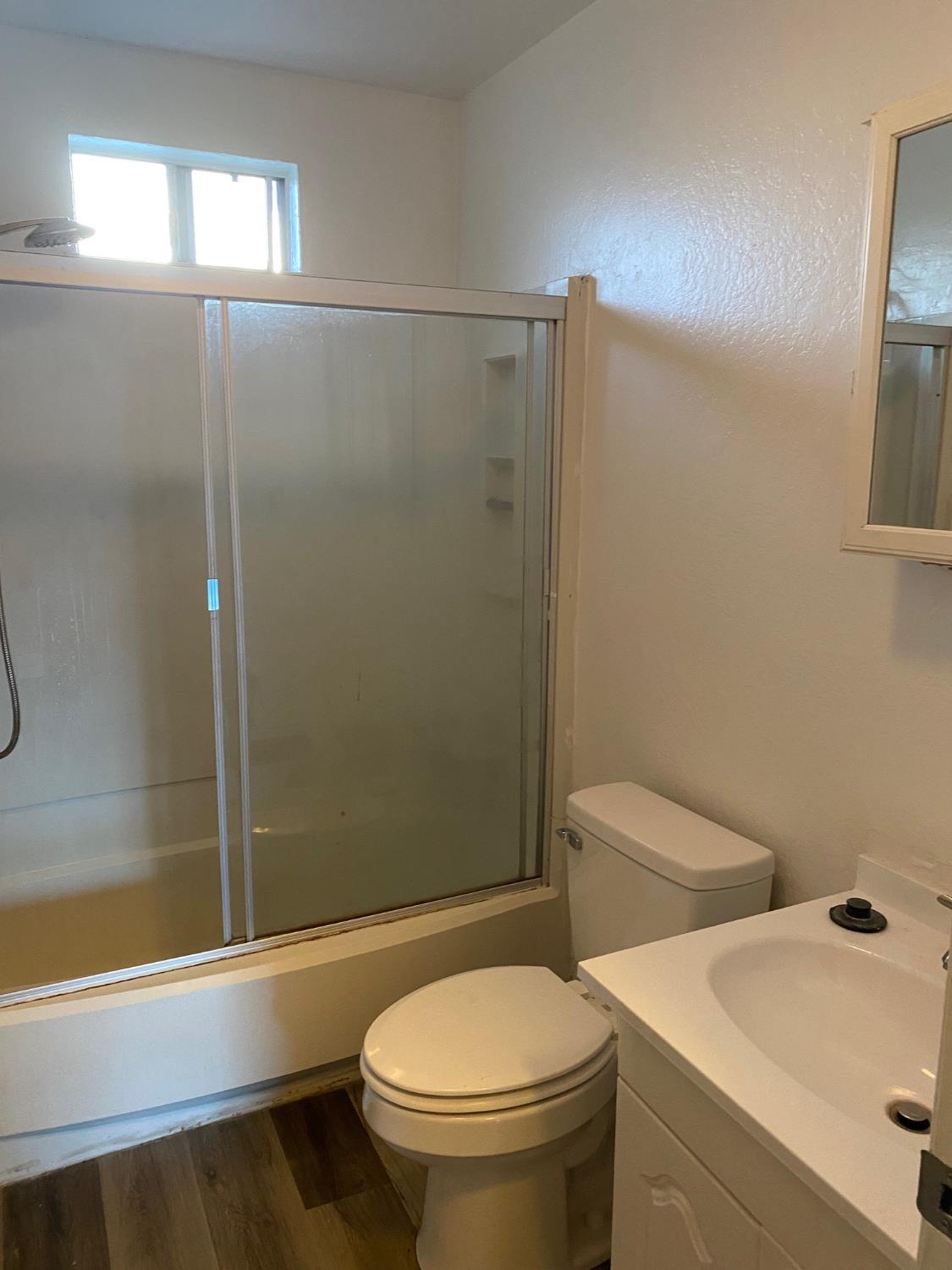 17 Raggio Road, Unit 4 Jackson, CA 95642 - Photo 11 of 11 a bathroom with a toilet and a shower