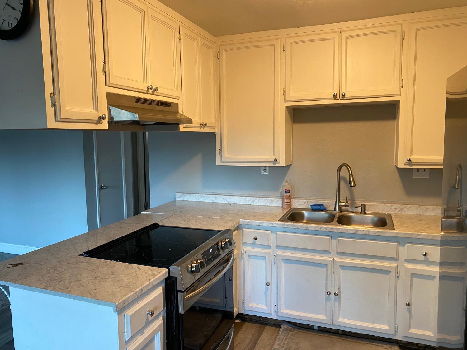 17 Raggio Road, Unit 4 Jackson, CA 95642 - Photo 2 of 11 a kitchen with stainless steel appliances granite countertop a sink stove and cabinets