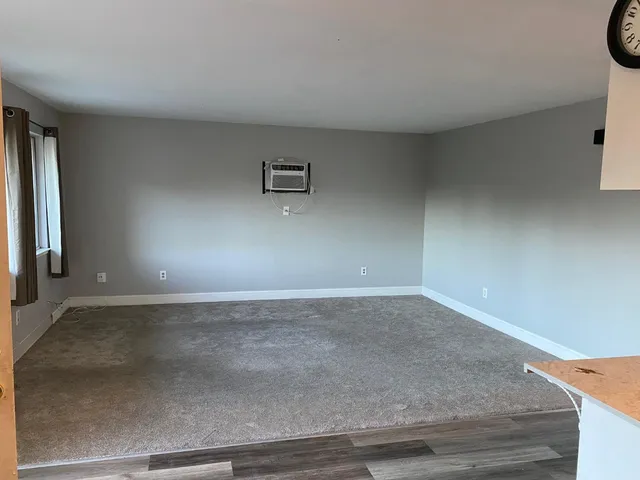 a view of a room with a window