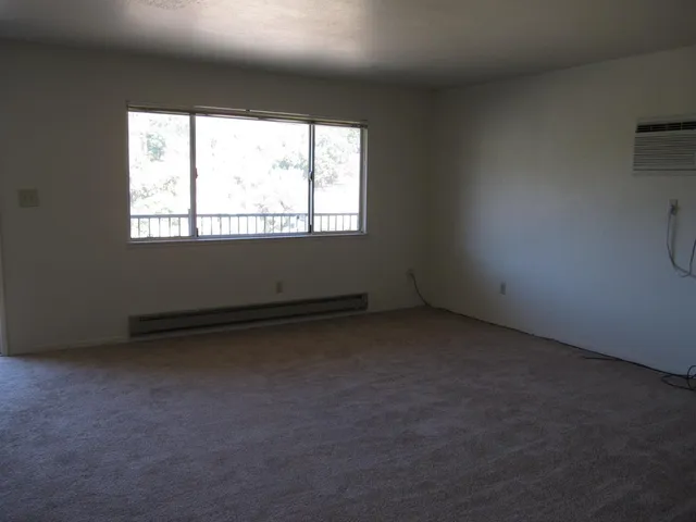 an empty room with a window