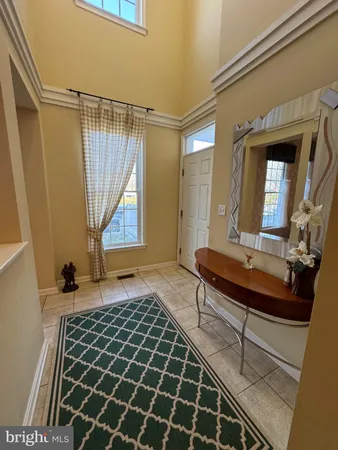 a kitchen with granite countertop a sink stainless steel appliances and cabinets