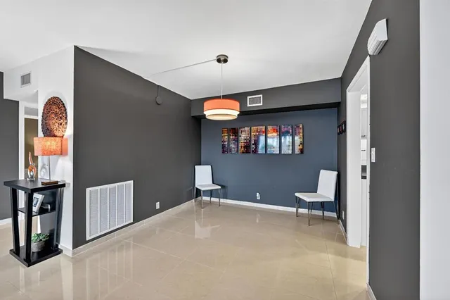 a view of a livingroom with a window