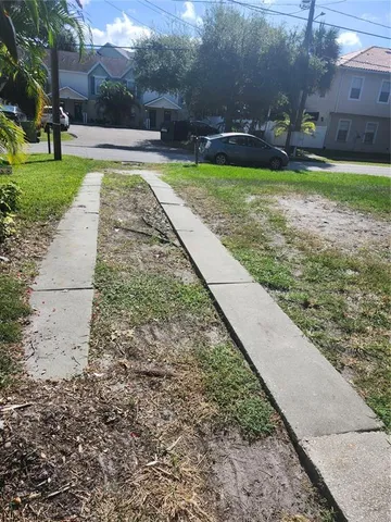 a view of yard with swimming pool