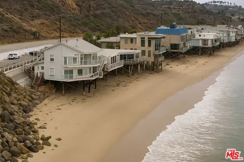a view of a house with wooden deck