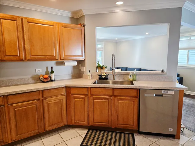 a kitchen with a sink and cabinets