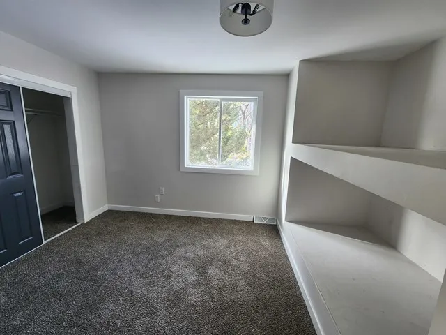 an empty room with windows