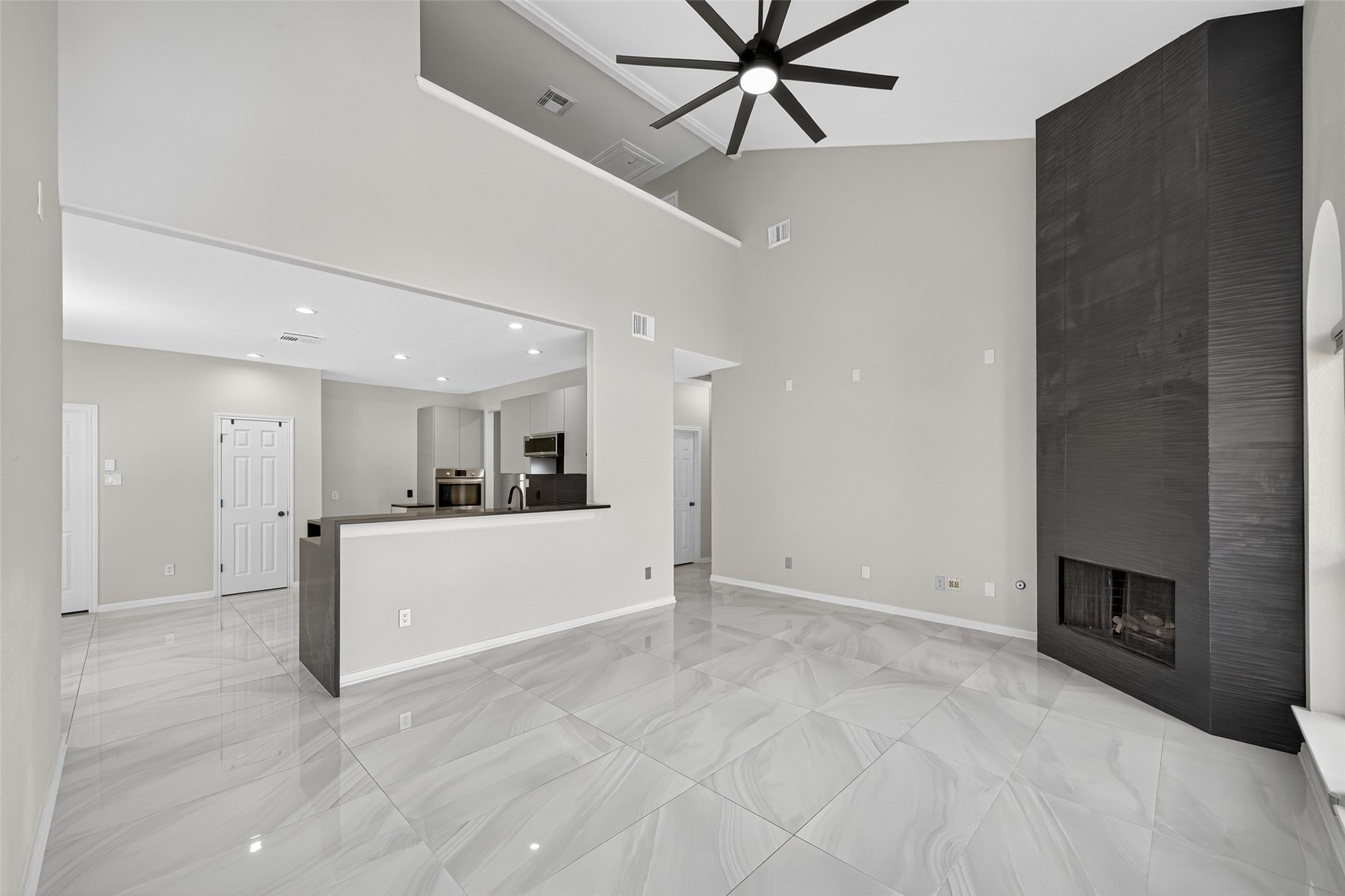 1003 Alp Springs Lane Spring, TX 77373 - Photo 18 of 43 a view of a livingroom with a ceiling fan