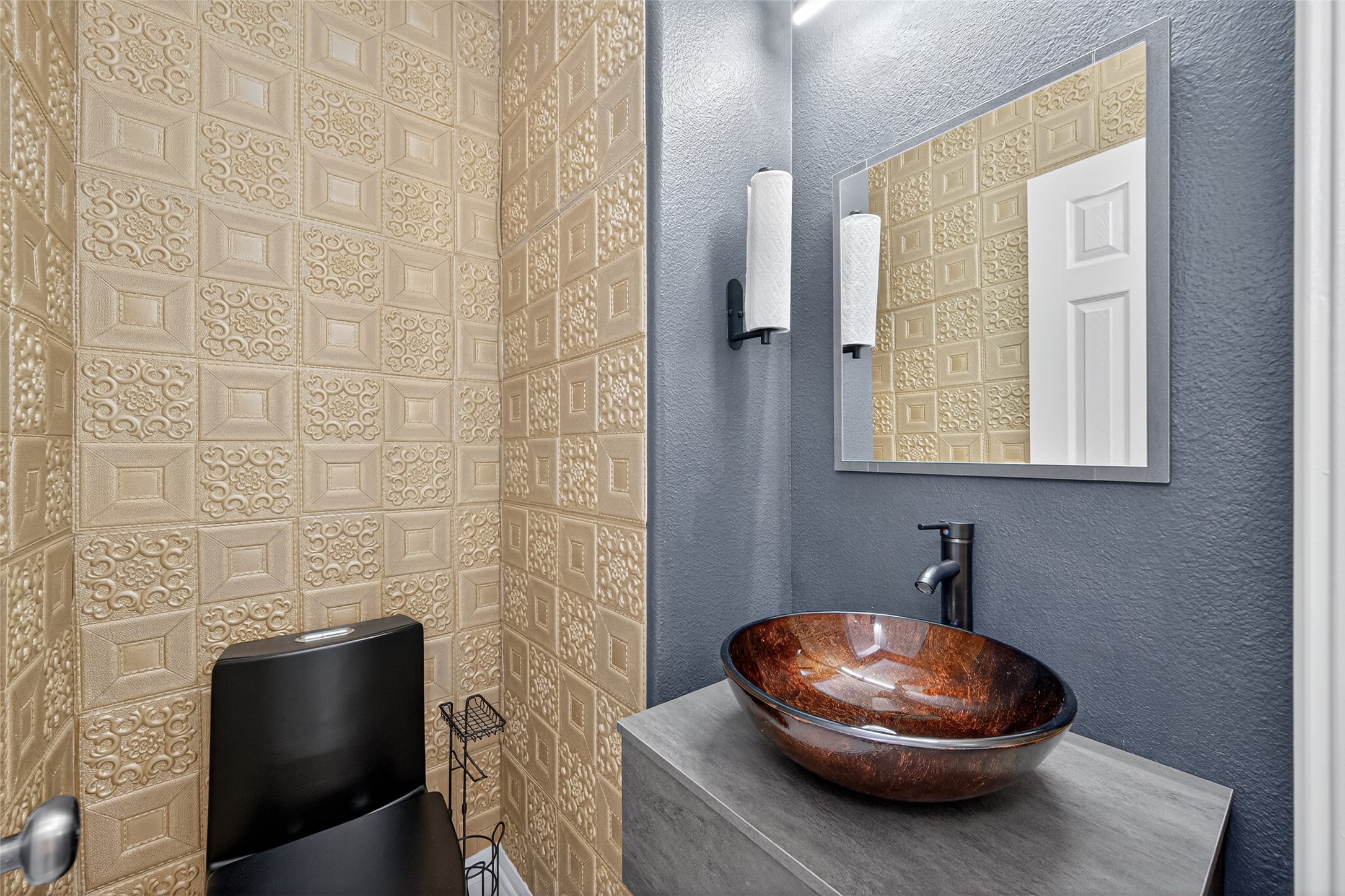 1003 Alp Springs Lane Spring, TX 77373 - Photo 20 of 43 a bathroom with a toilet and a mirror