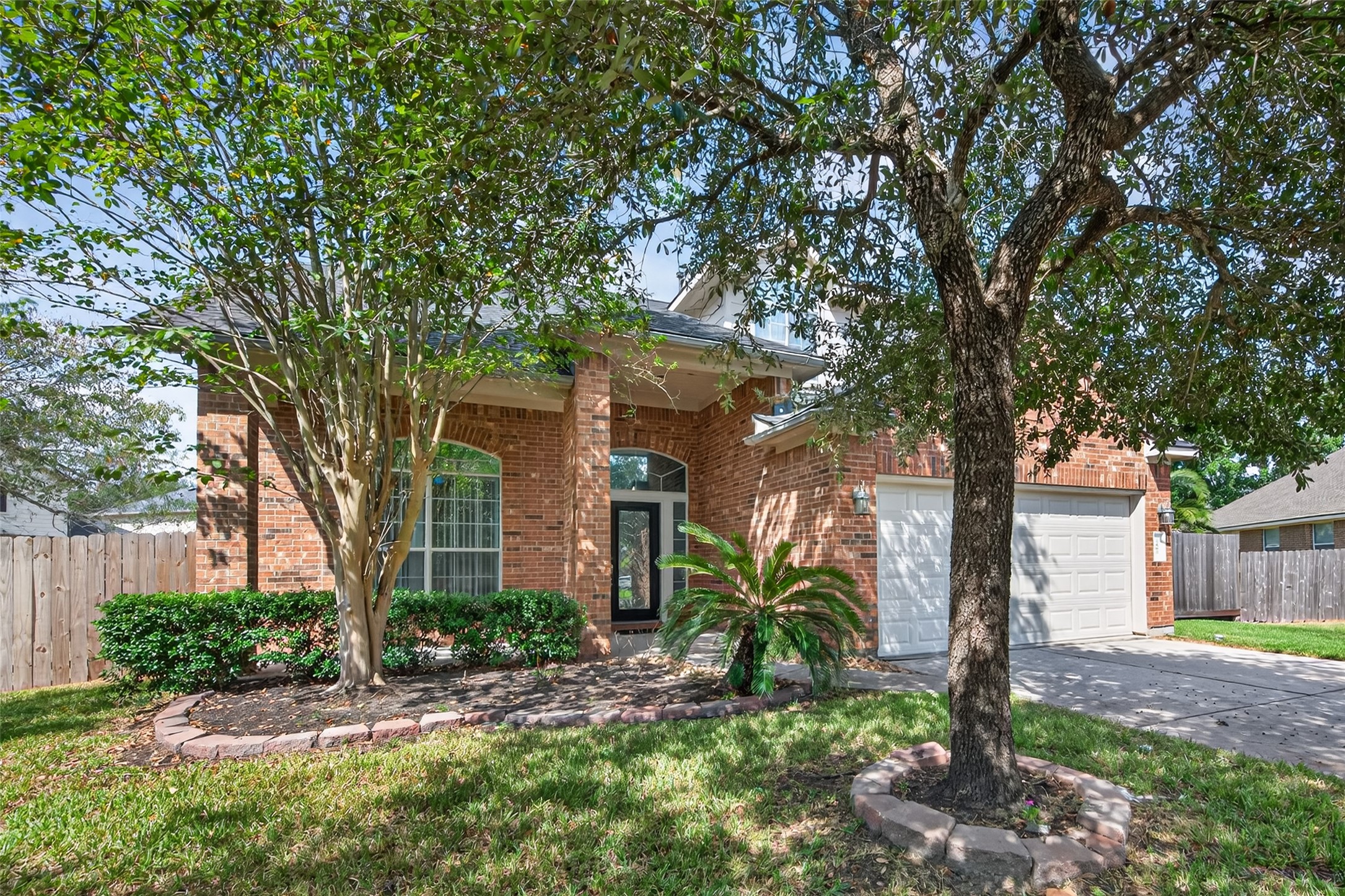 1003 Alp Springs Lane Spring, TX 77373 - Photo 2 of 43 a front view of a house with garden