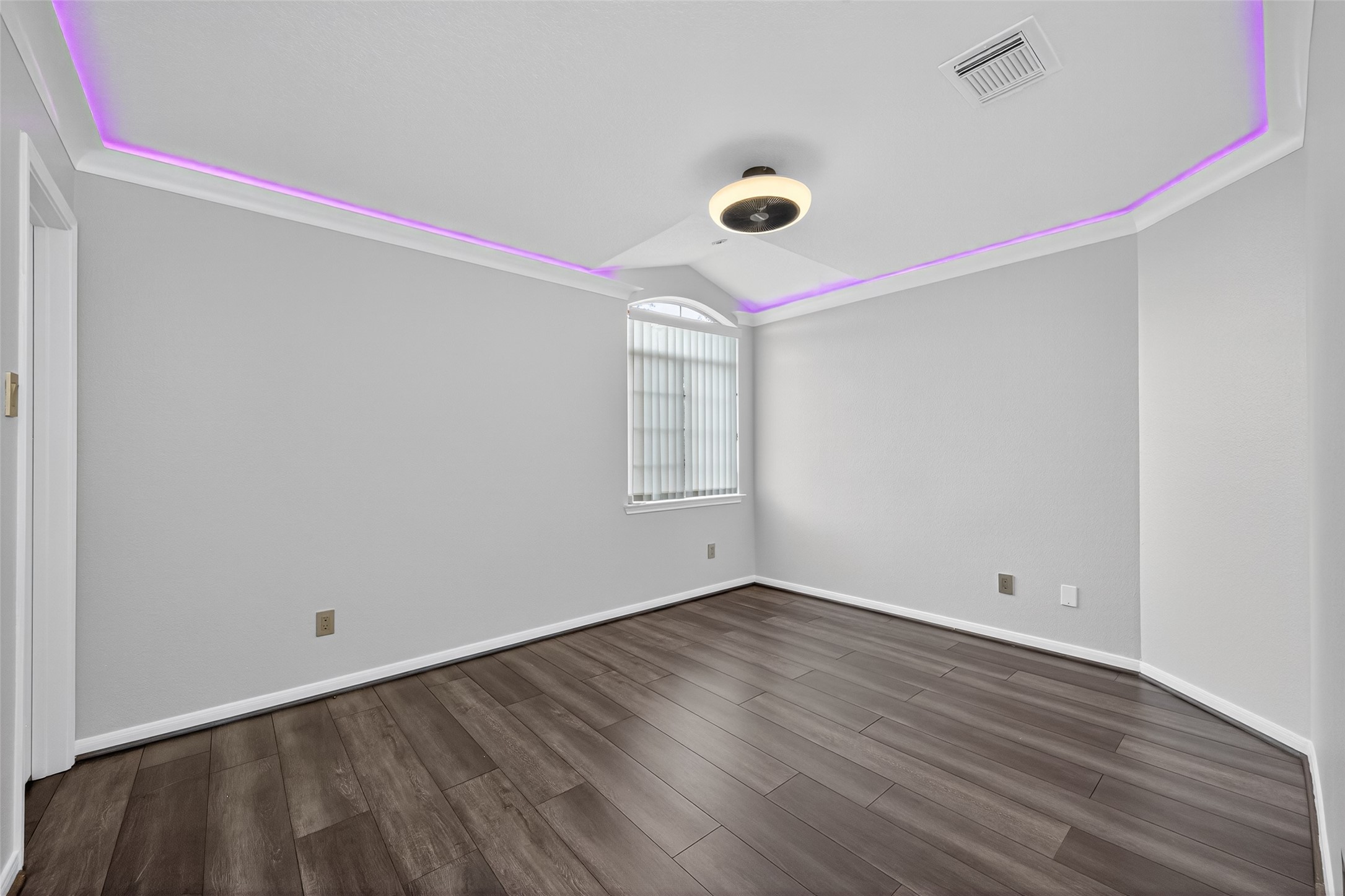 1003 Alp Springs Lane Spring, TX 77373 - Photo 29 of 43 a view of an empty room with wooden floor and a window