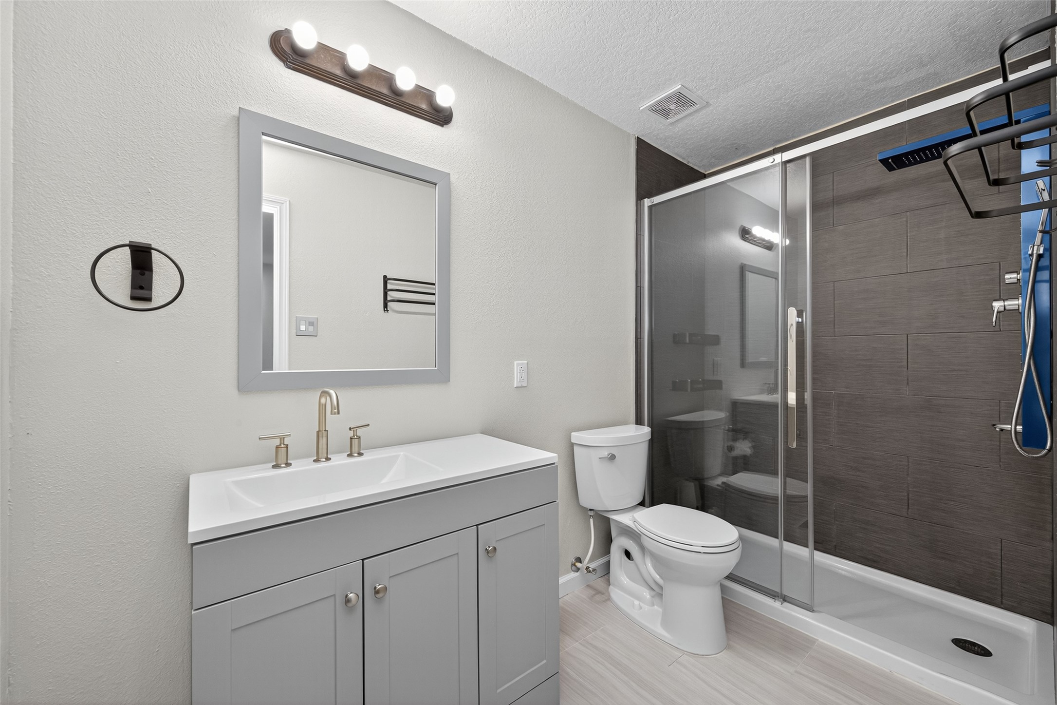 1003 Alp Springs Lane Spring, TX 77373 - Photo 30 of 43 a bathroom with a toilet sink and shower