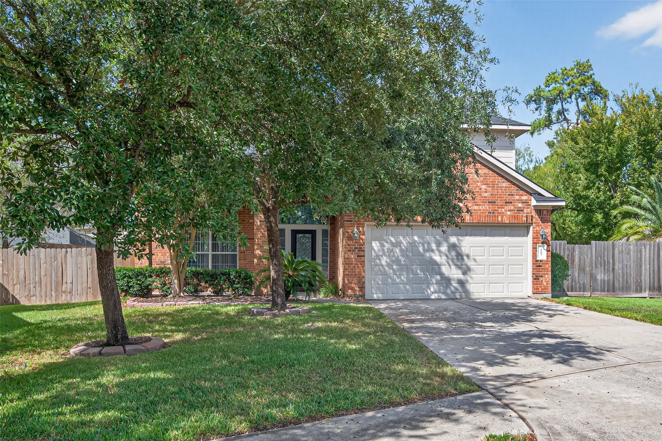 1003 Alp Springs Lane Spring, TX 77373 - Photo 3 of 43 a view of a backyard with a tree