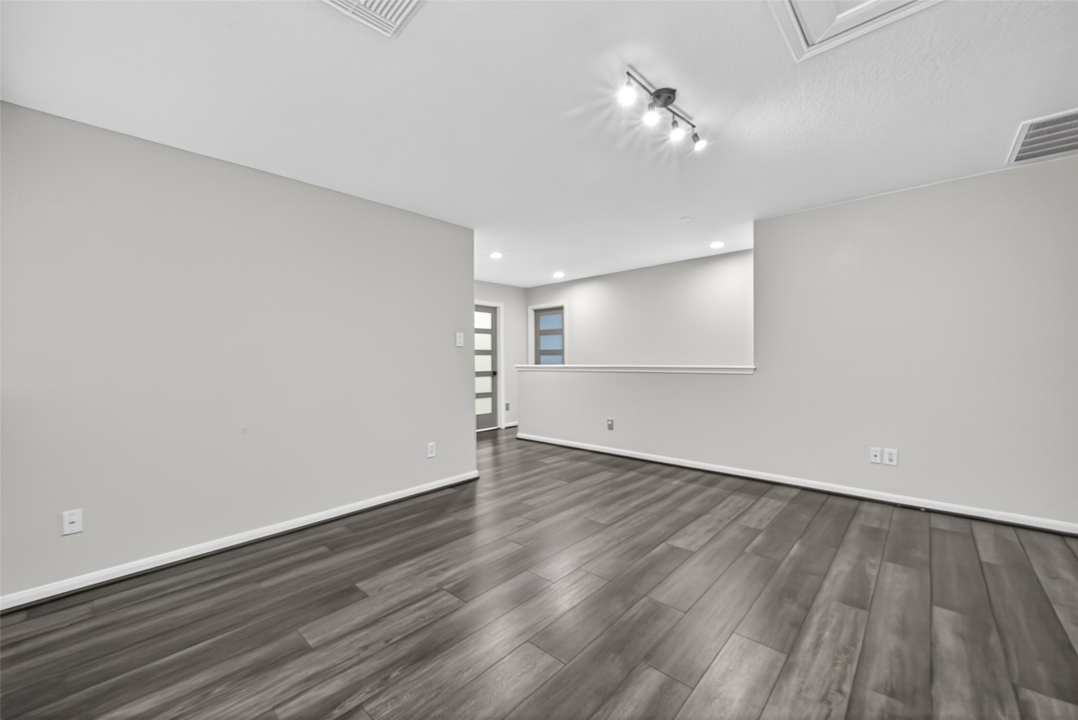 1003 Alp Springs Lane Spring, TX 77373 - Photo 33 of 43 wooden floor in an empty room with a window